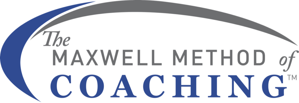 A black and white photo of the logo for howell media coaches.